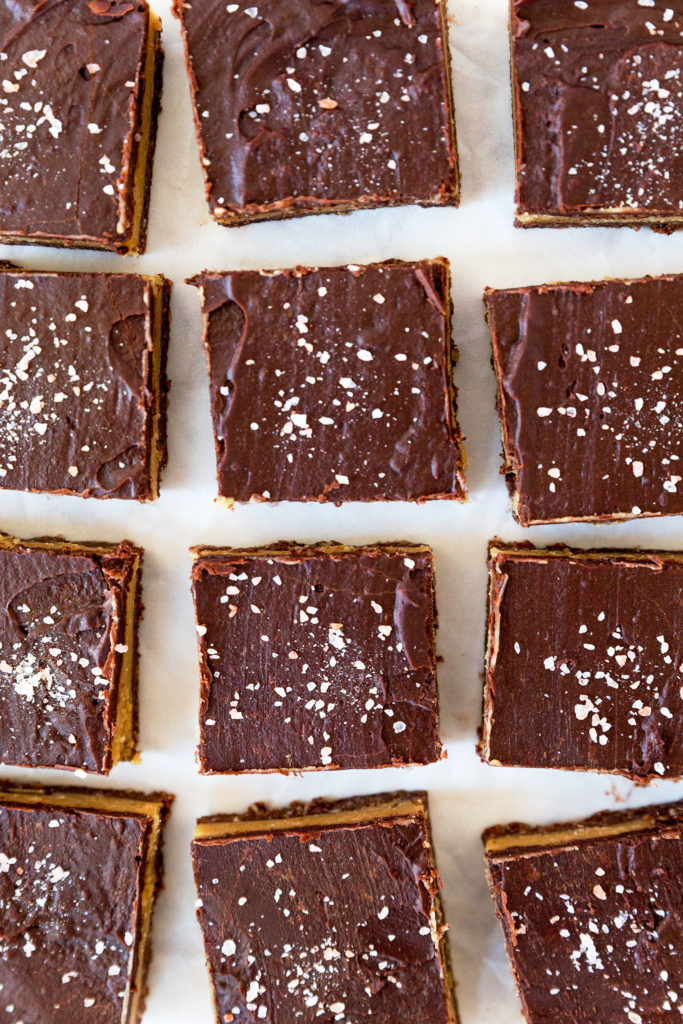 raw caramel slice on parchment paper