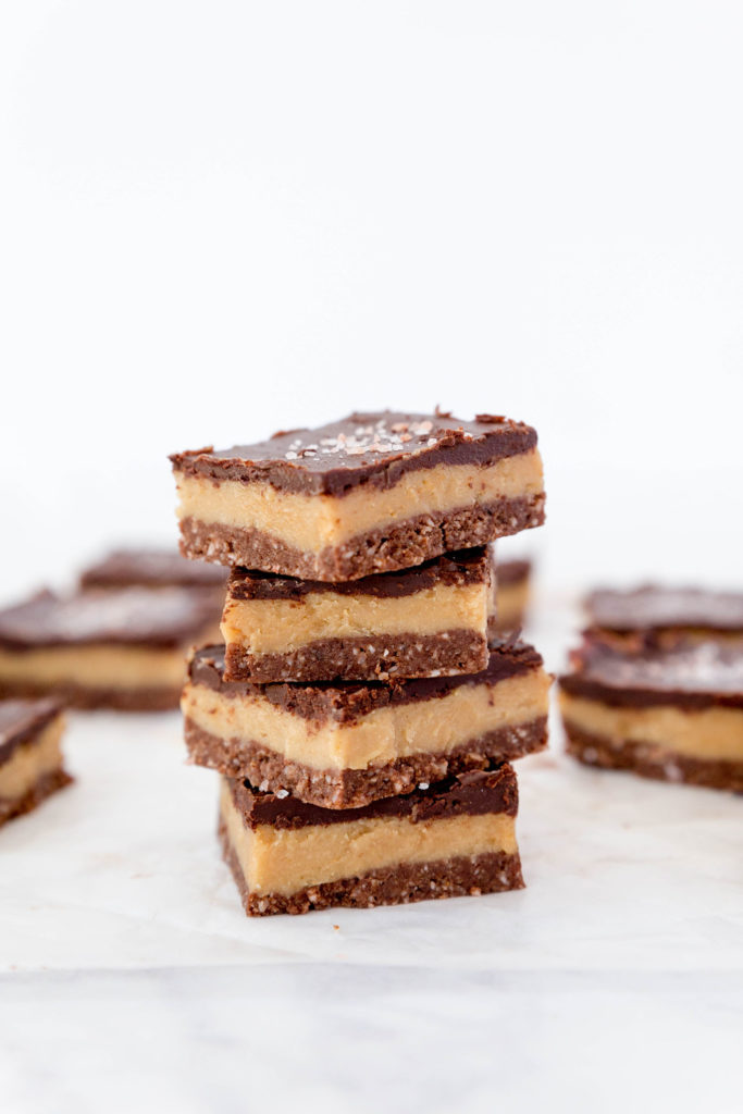 4 pieces of caramel slice stacked on top of each other