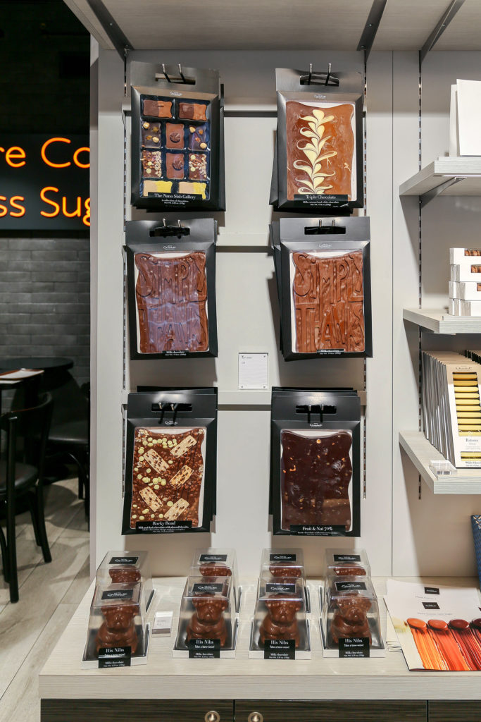 Large blocks of chocolate hanging from the wall