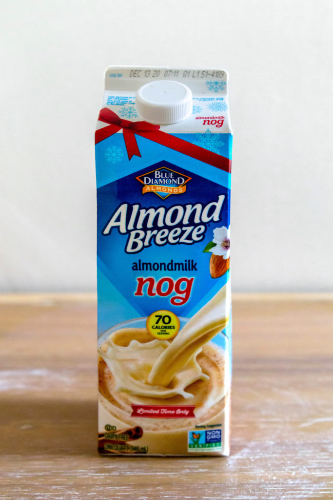 A photo of a carton of Almond Breeze eggnog.