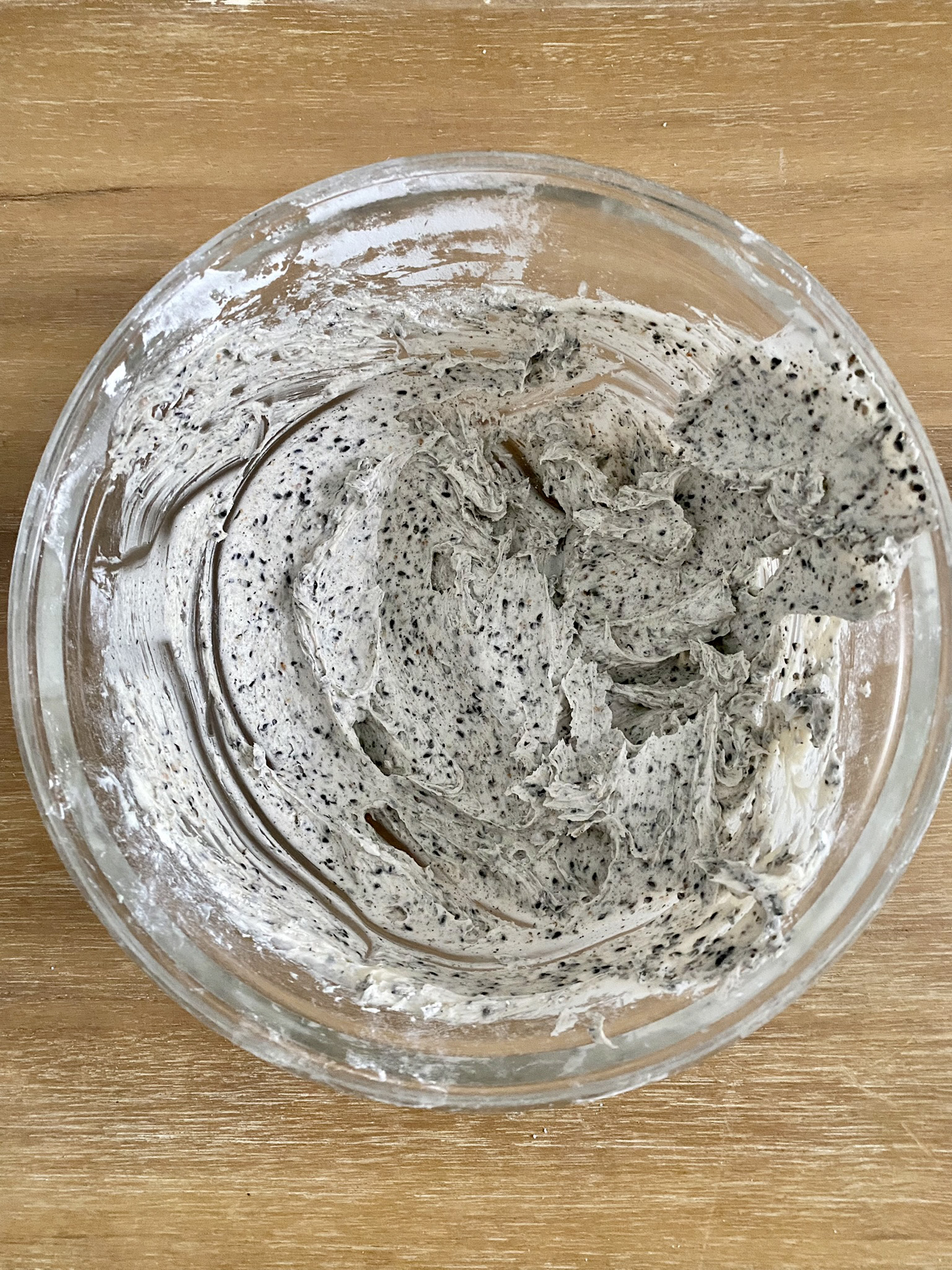 black sesame frosting in mixing bowl